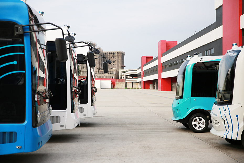 TURING Drive's Autonomous Shuttle Fleet, including 6-meter SAPPHIRE and 3-meter OPAL buses, with Velodyne Puck lidar sensors