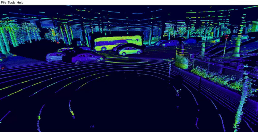 Velodyne Lidar point cloud of a busy street with a bus and cars